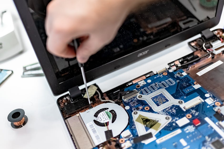 Technician repairing a computer